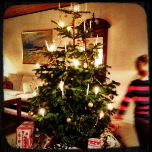 Dancing around the Christmas tree on Christmas Eve..